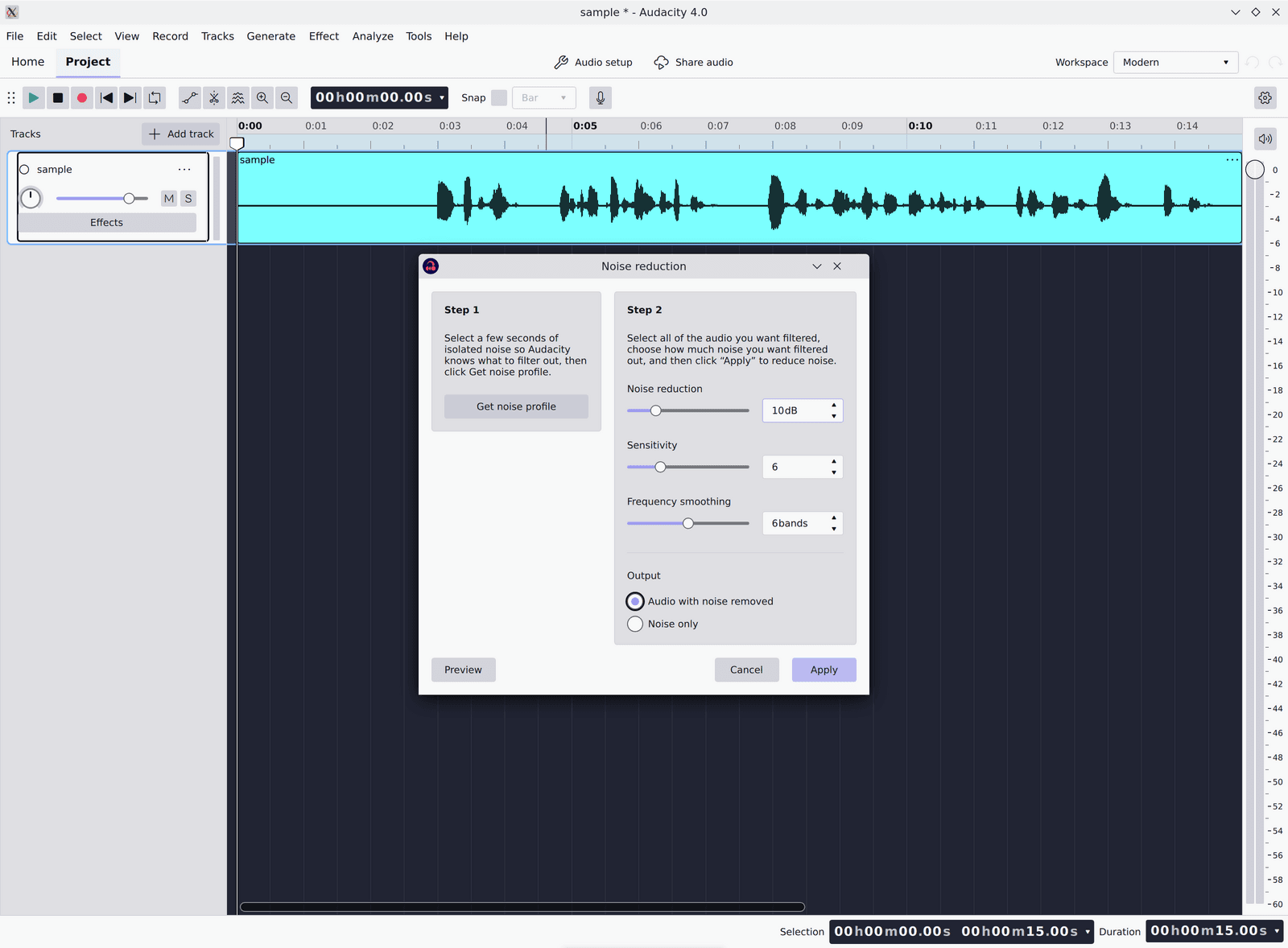 The Noise reduction dialog with the whole track selected behind it, Noise reduction set to 10 dB, Sensitivity at 6, Frequency smoothing at 6 bands and Output on Audio with noise removed.